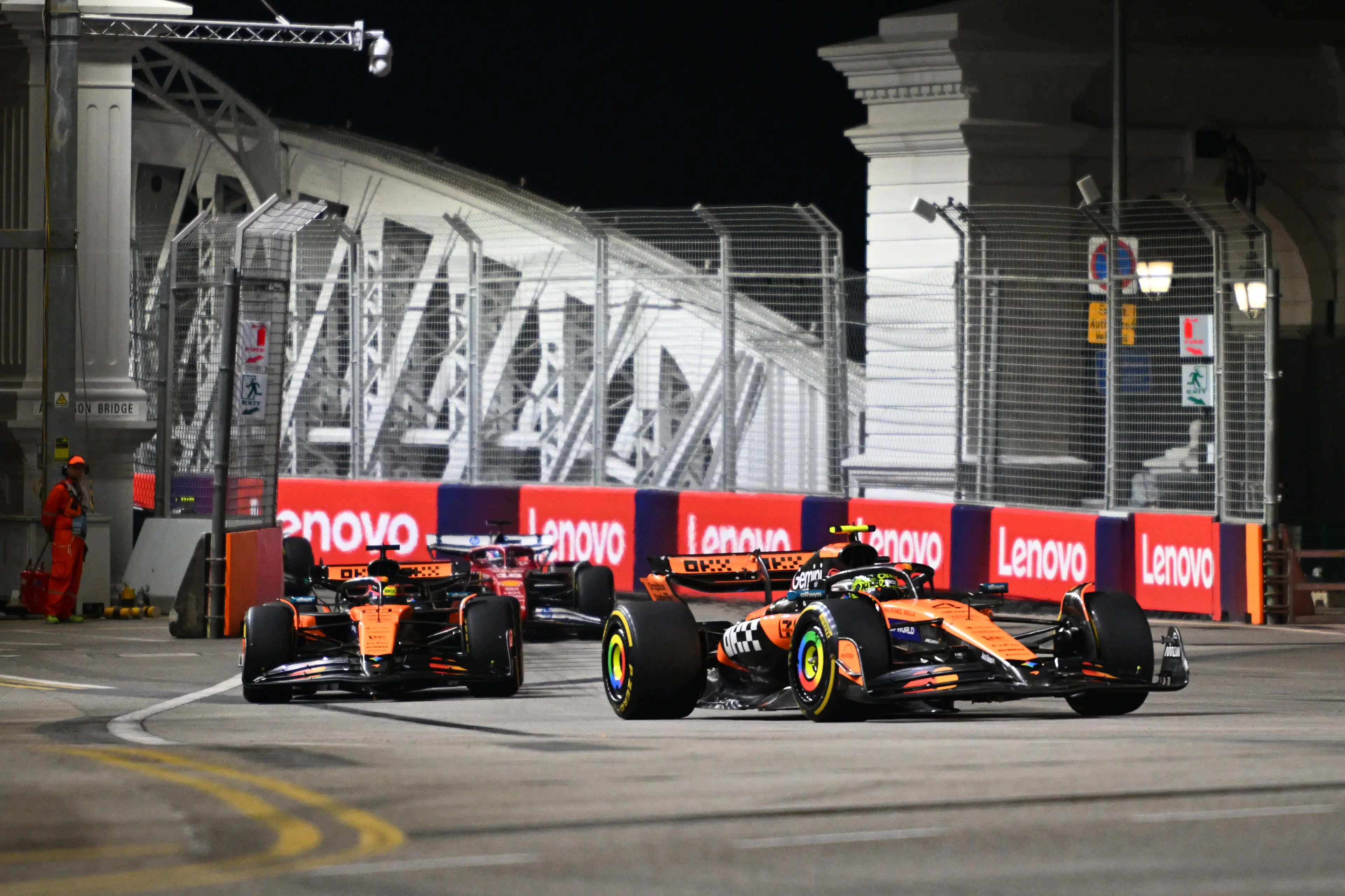 Lando Norris and Oscar Piastri racing in Singapore. (Image: Clive Mason / Staff via Getty)