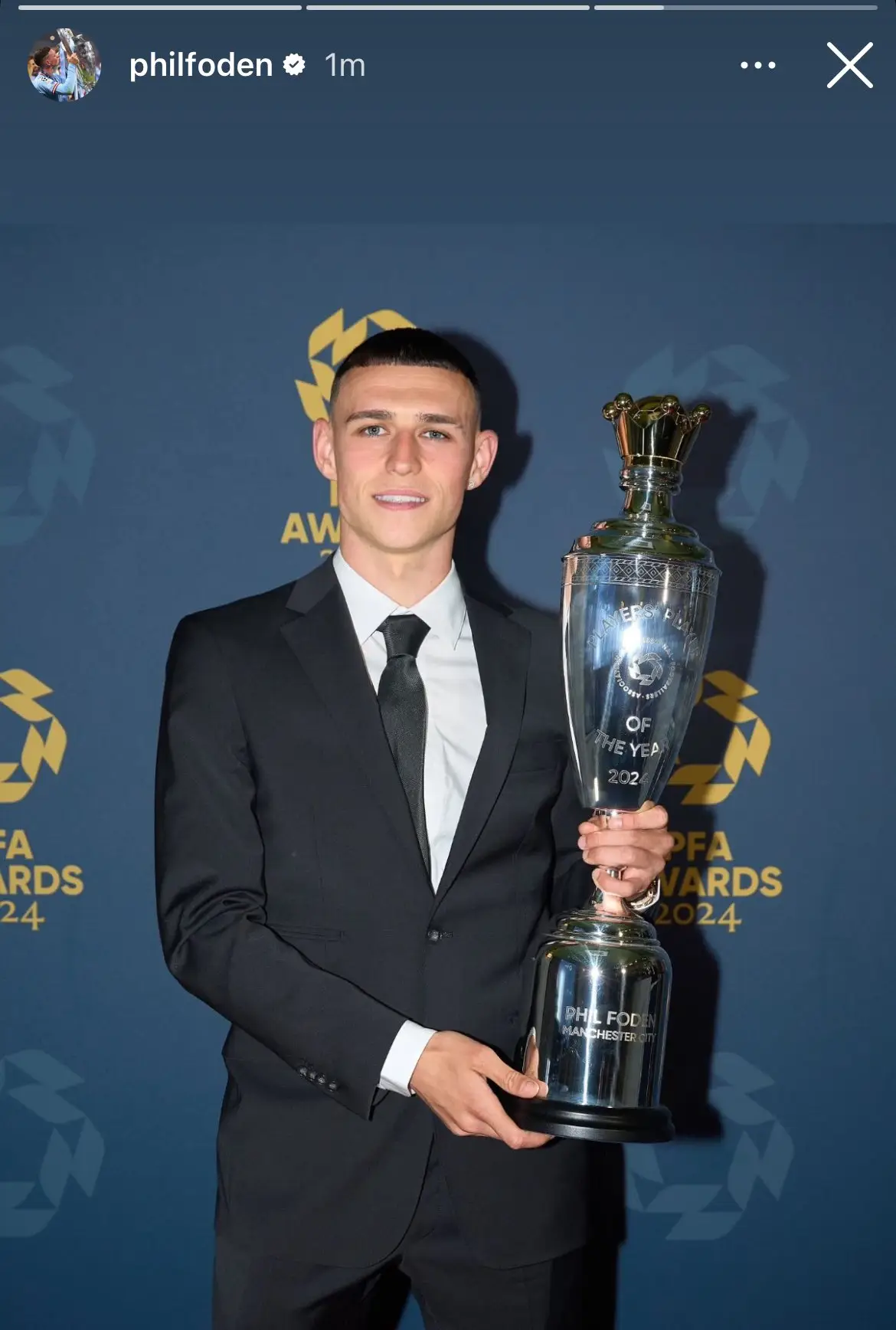 Phil Foden took to social media to re-post an image of himself with the PFA Players' Player of the Year award from last season. Image: Instagram/Phil Foden