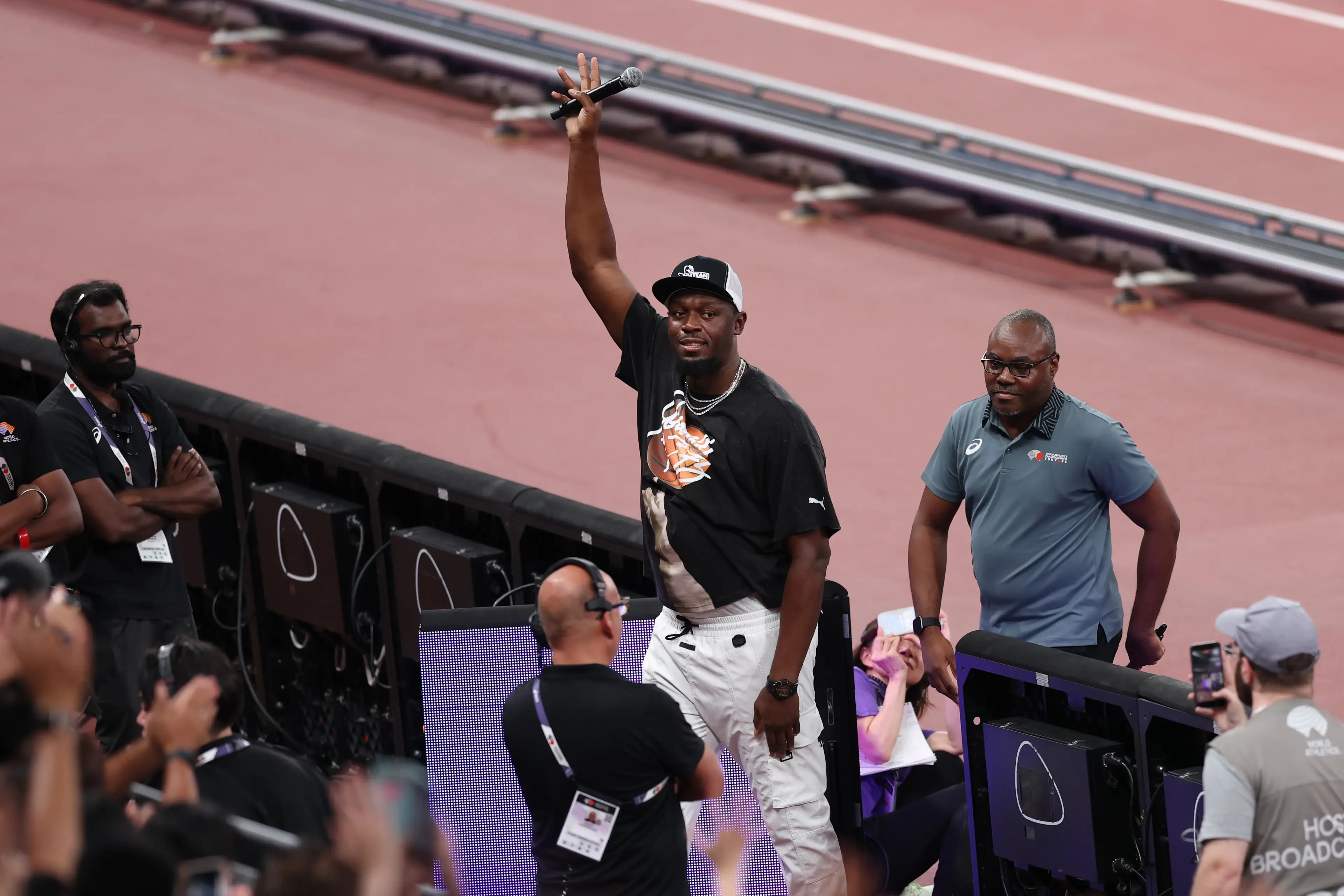 Usain Bolt acknowledges the crowd at the 2025 World Athletics Championships. Image: Getty 