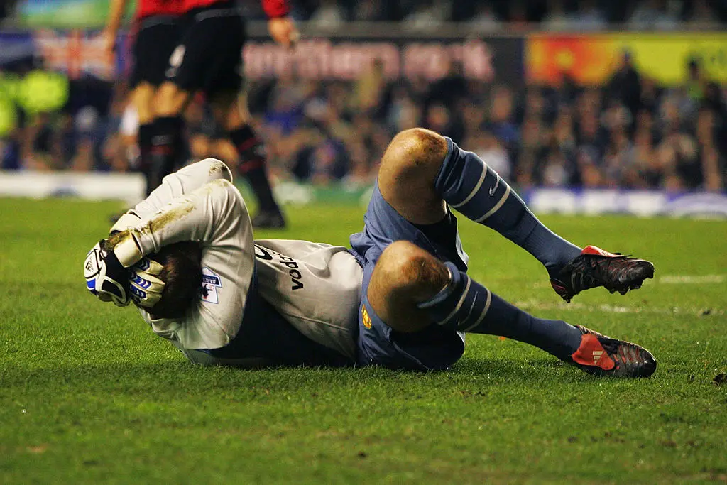 Man Utd goalkeeper Roy Carroll was struck by an object thrown from Everton fans (Credit:Getty)