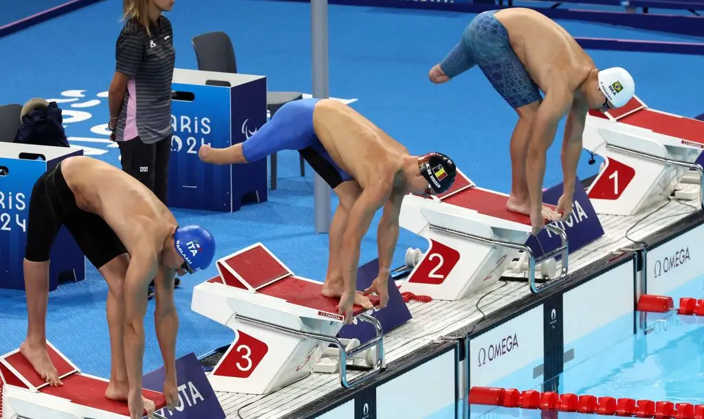 Athletes take part in para swimming at the 2024 Paralympics -