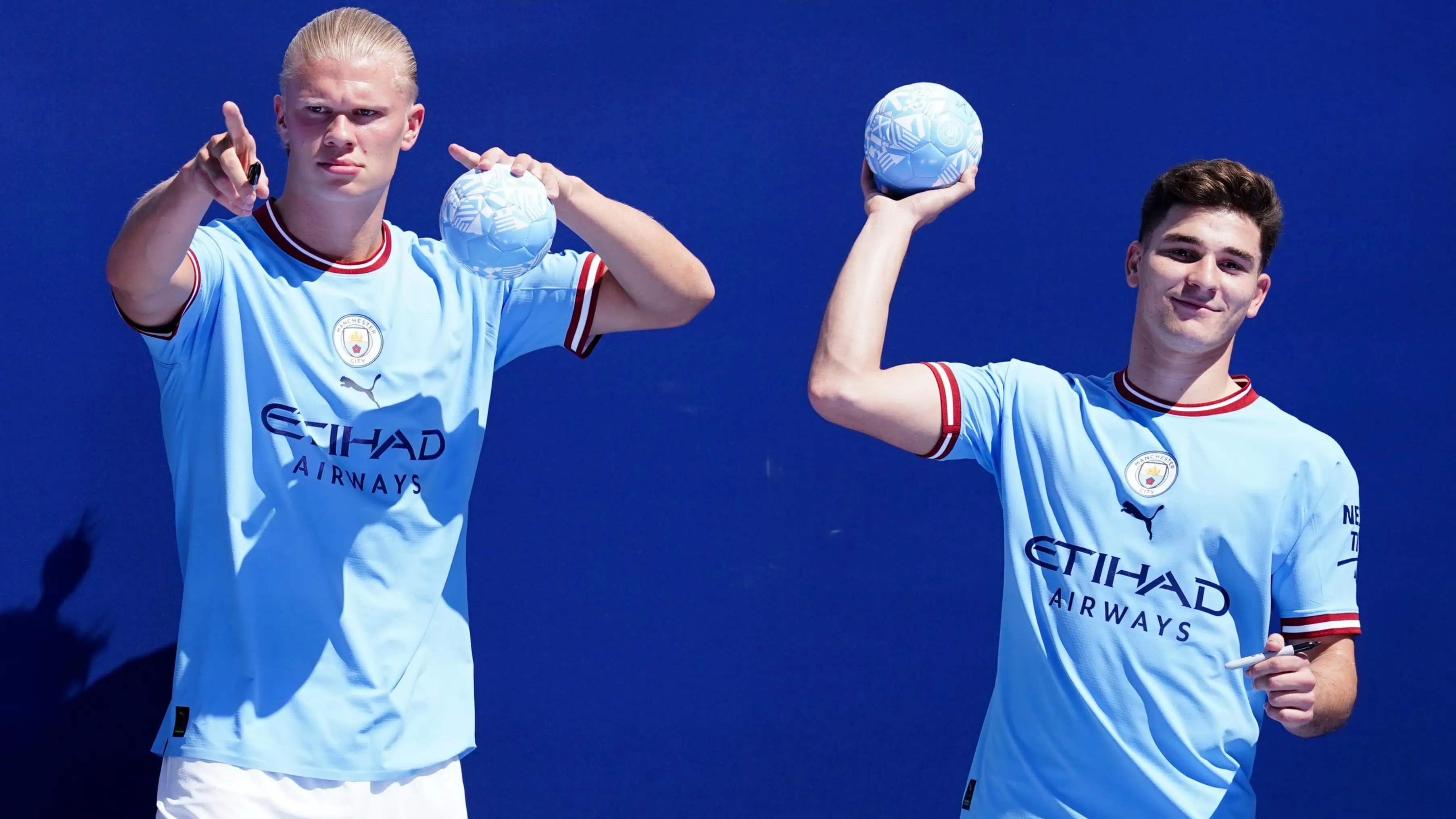 Erling Haaland and Julian Alvarez meet Manchester City fans.