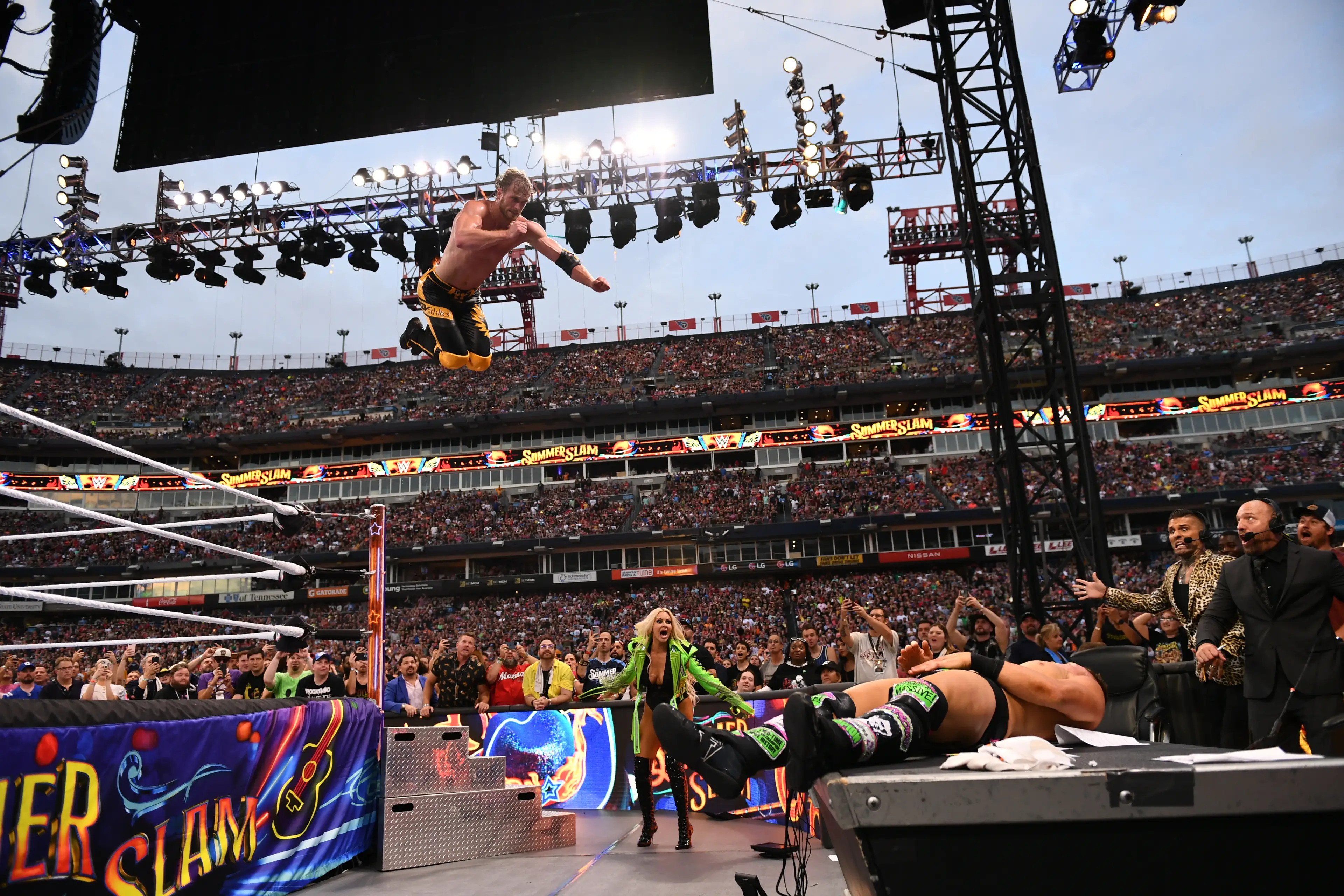 Paul hit an elbow drop on The Miz through a table at SummerSlam. (Image