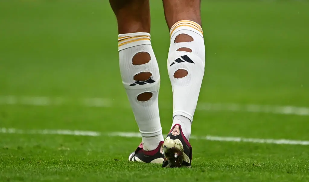 Jude Bellingham regularly cuts holes in his socks (Image: Getty)