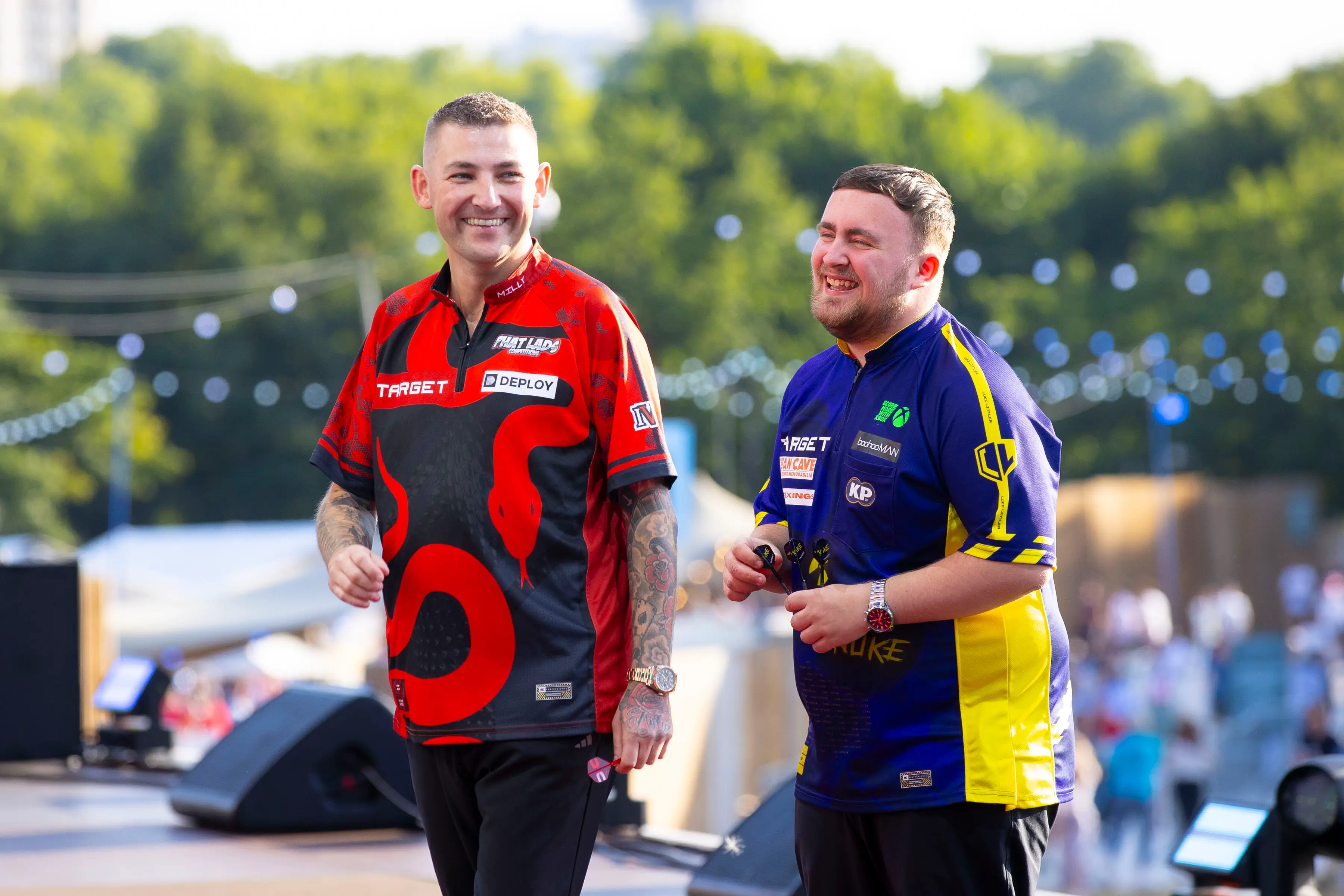 Nathan Aspinall and Luke Littler during the The Hyde Park Darts Championship in July. Image credit: Getty