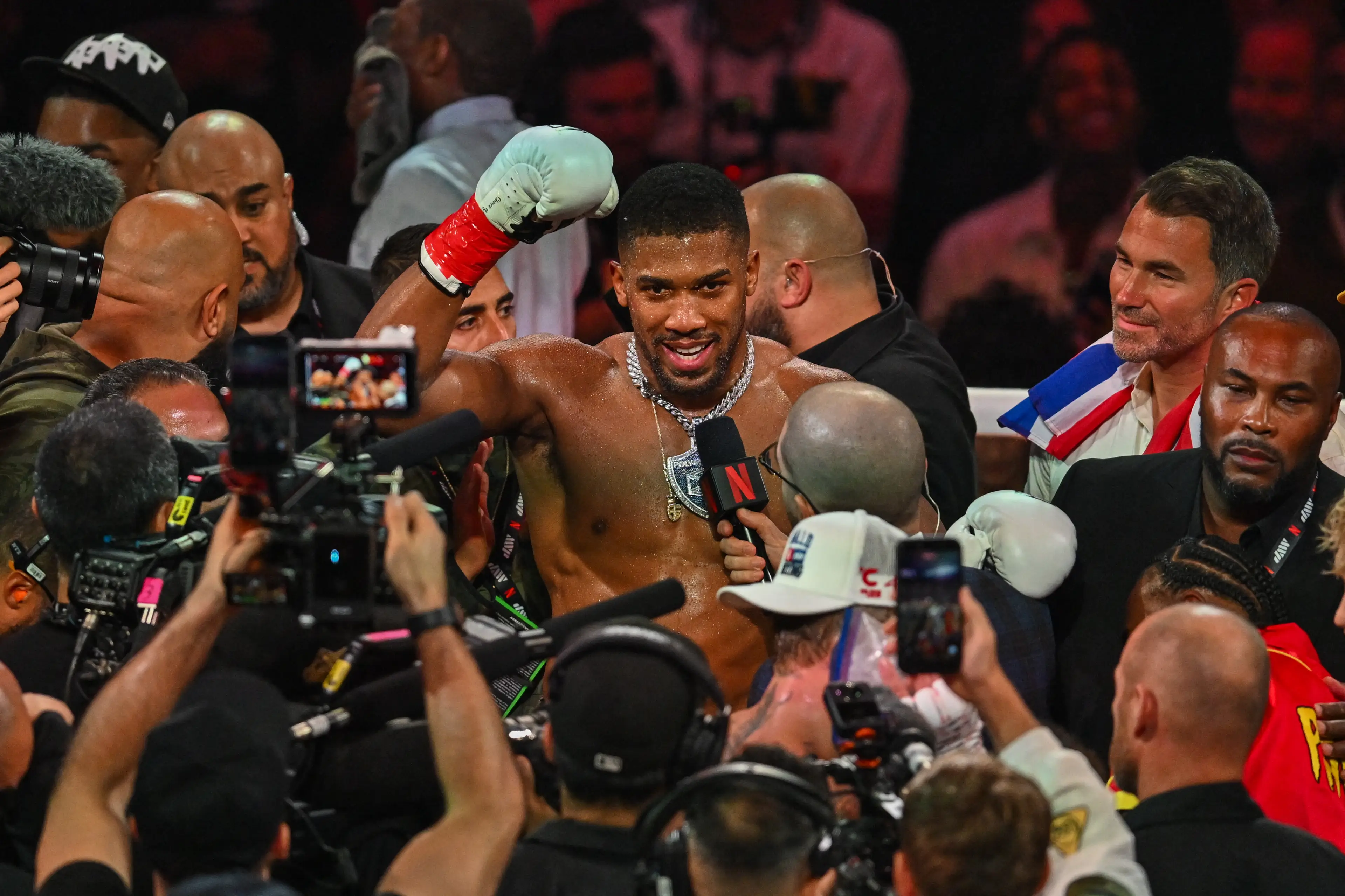 Anthony Joshua and Eddie Hearn shared an exchange immediately after the Jake Paul fight result. Image: Getty 