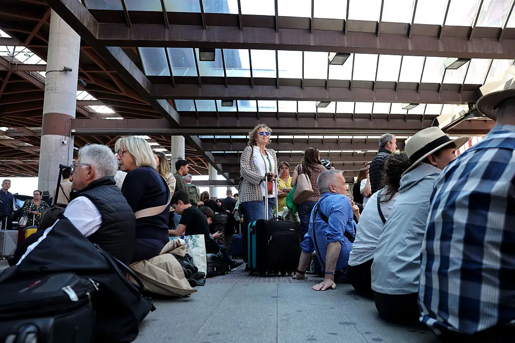 Power is beginning to return to certain areas, but there is no clear timescale for when people will be able to travel again (Thomas Coex/AFP via Getty Images)
