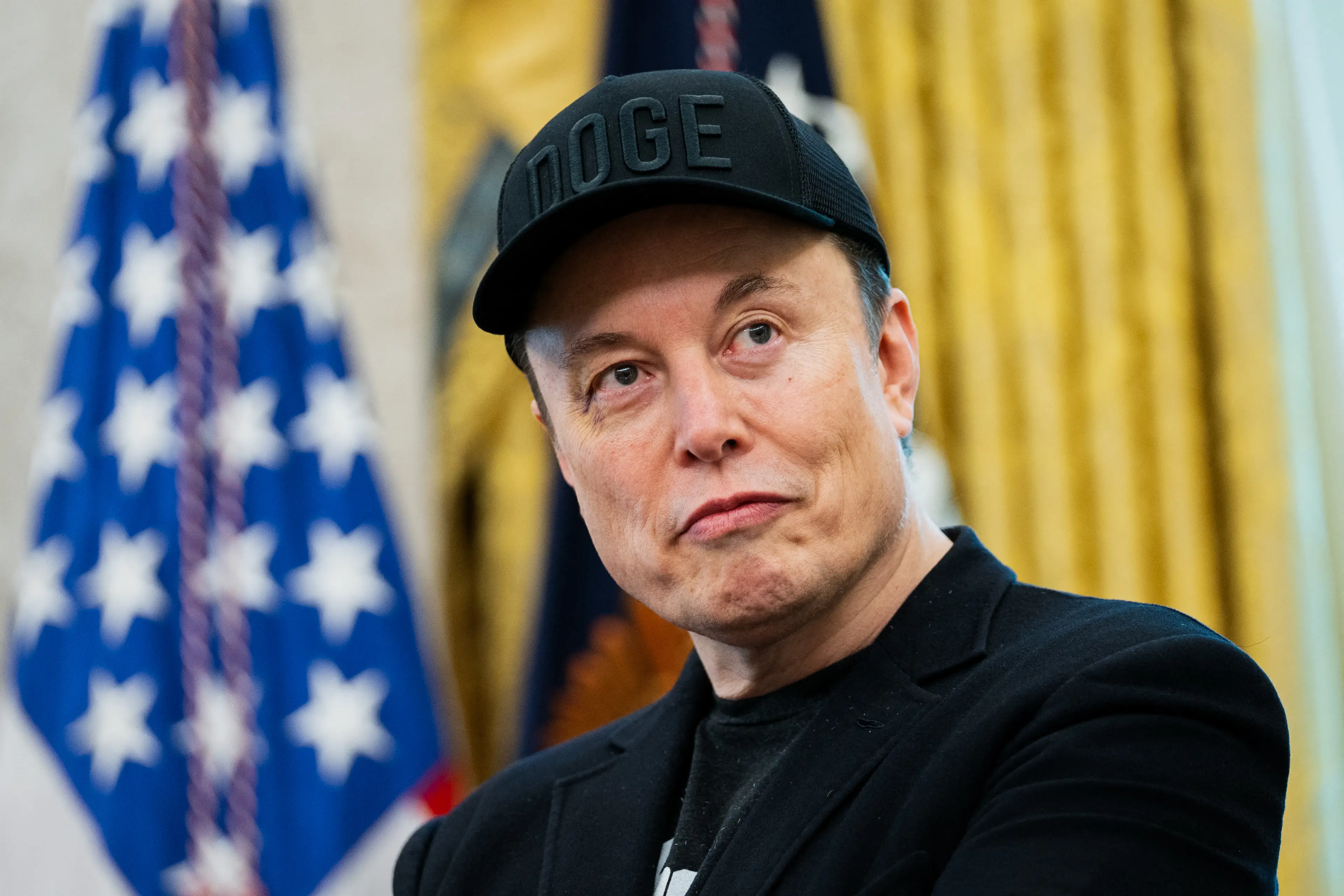 Elon Musk's Tesla is being sued (ALLISON ROBBERT/AFP via Getty Images)