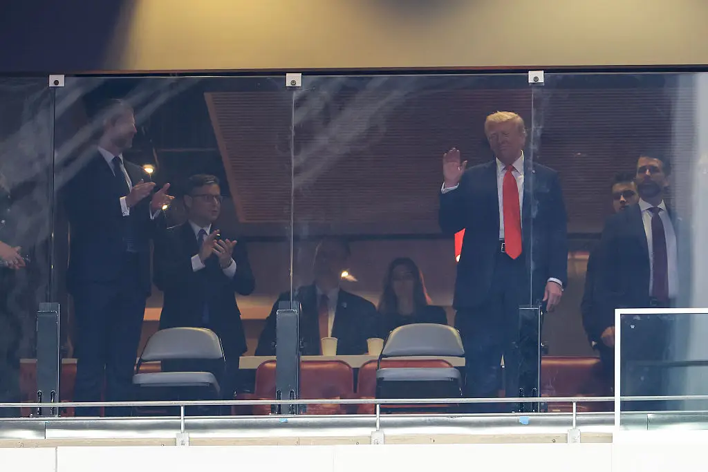 Trump's smiled, waved, and offered a thumbs up in response to the impression from his eldest son (Joe Raedle/Getty Images)