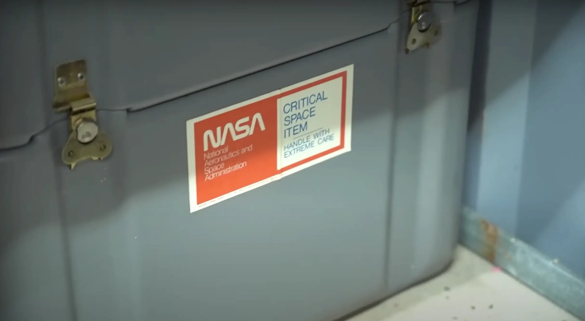 Inside he found a load of space memorabilia, including photographs, patches and a letter thanking the astronaut for their contribution to the space programme (YouTube/@penguinz0)