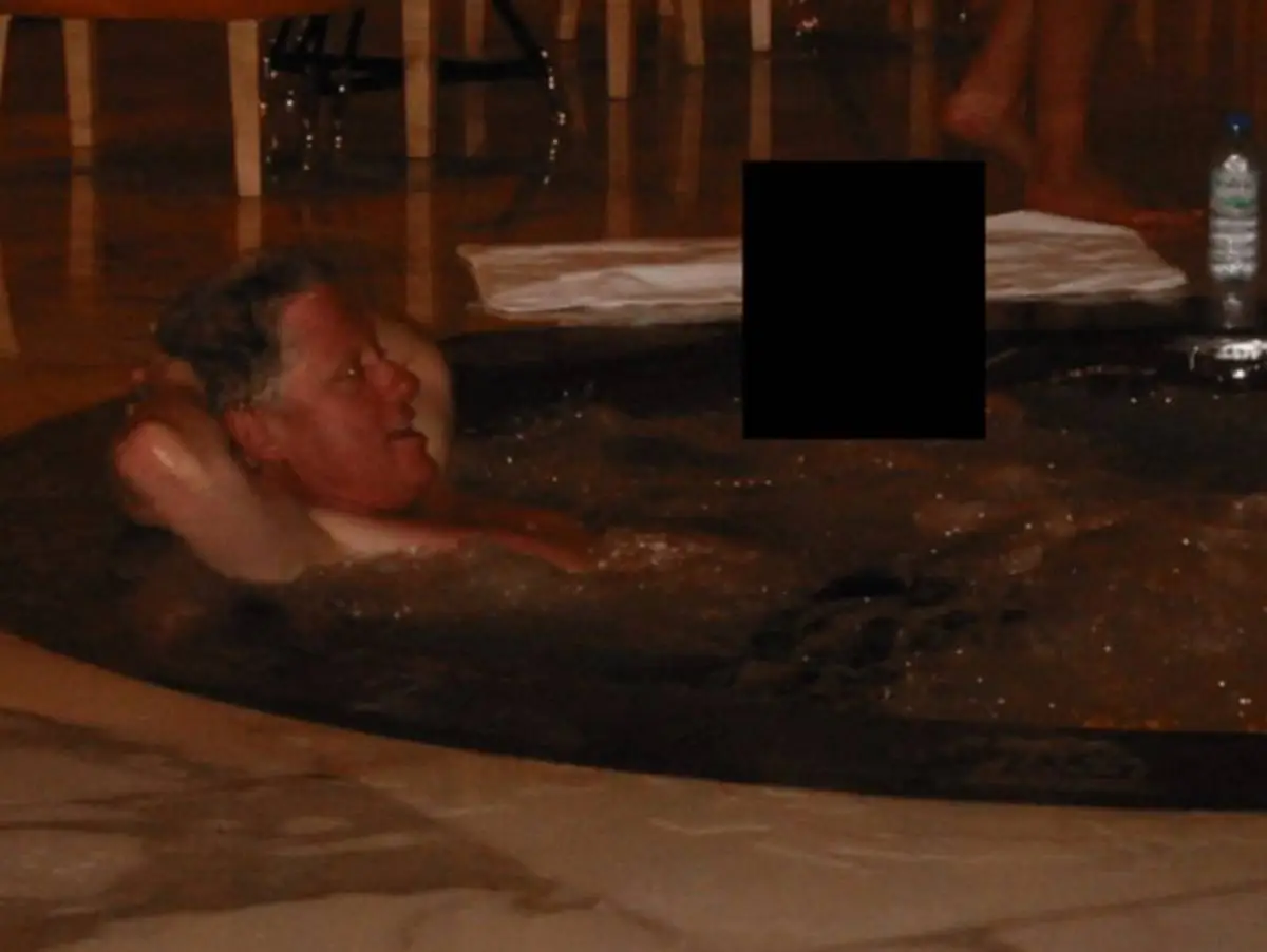 A spokesperson for Clinton has spoken out about the photographs (US Department of Justice)