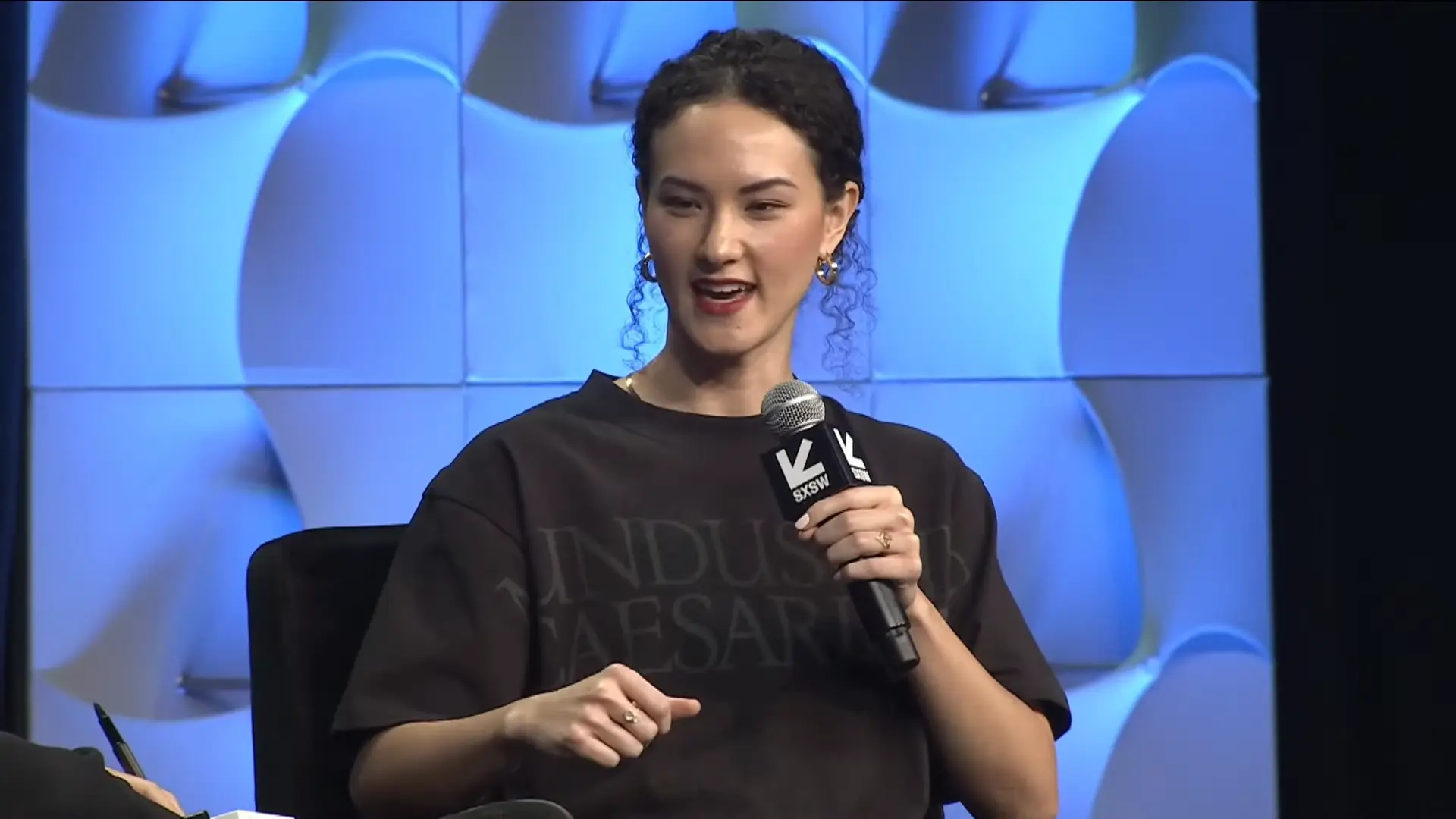 Bluesky CEO Jay Graber's t-shirt has drawn a lot of attention (YouTube/SXSW)