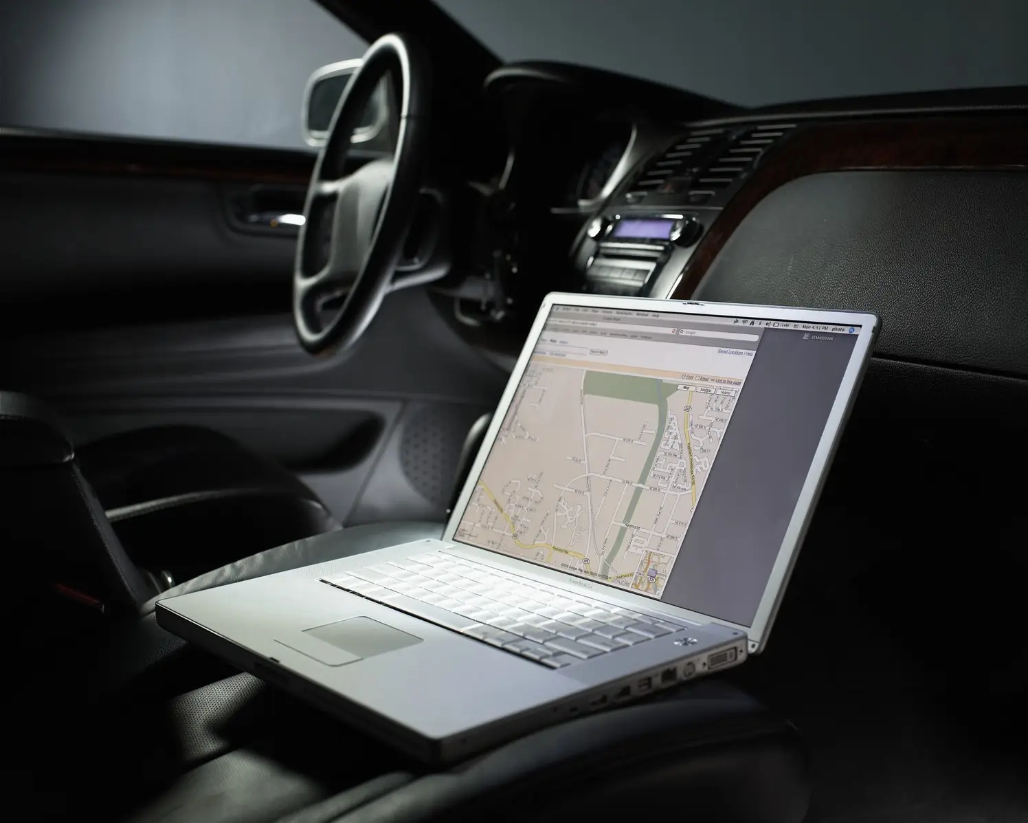 A turned-on laptop inside a car, which could be damaged if left on a hot day (Getty Images)