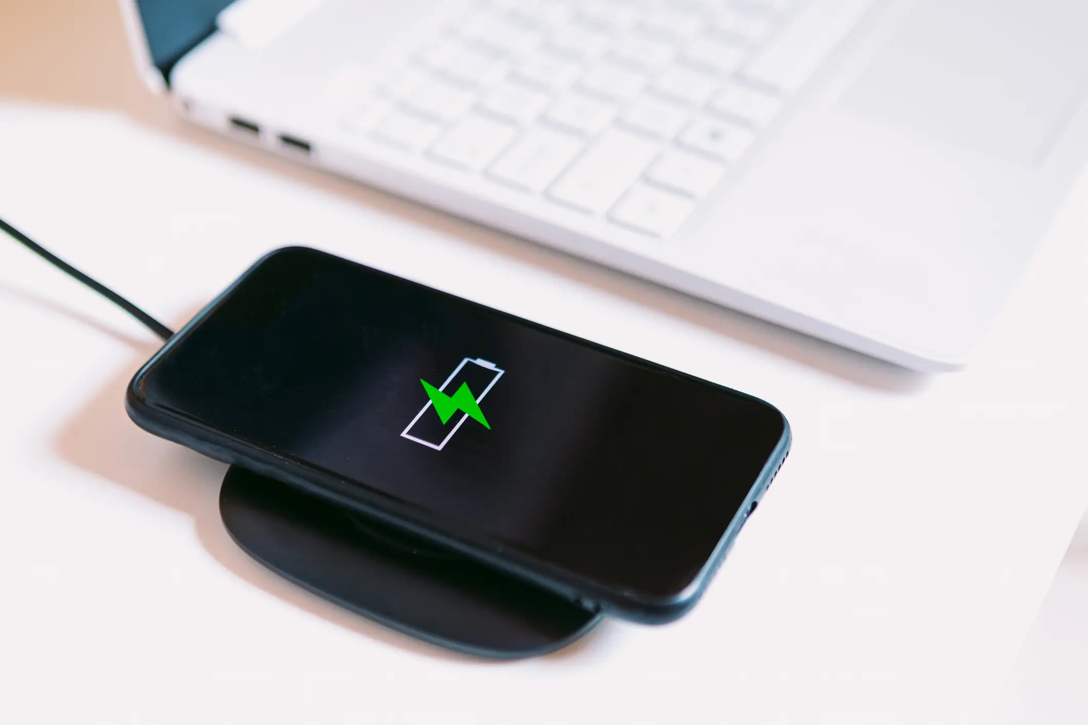According to the YouTuber, you should never let your phone reach 100% while charging (DBenitostock/Getty Images)