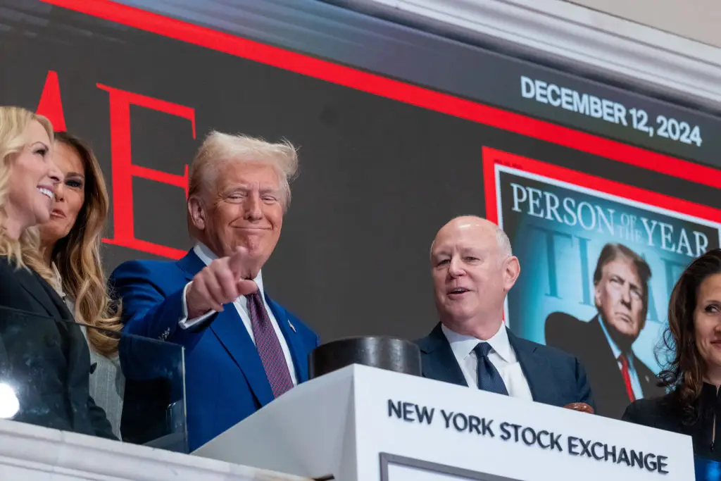 Many are wondering whether Trump's stock market dealings could be considered illegal or insider trading (Spencer Platt/Getty Images)