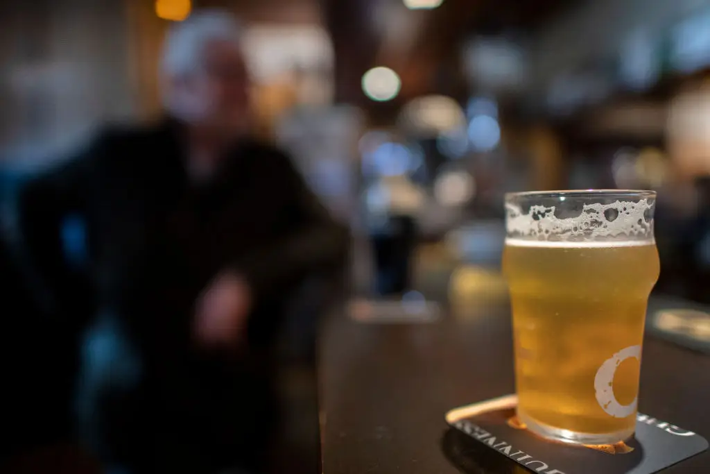 For some it isn't as simple as putting the pints down, as they experience severe and harmful withdrawal symptoms (Fred Tanneau/AFP via Getty Images)