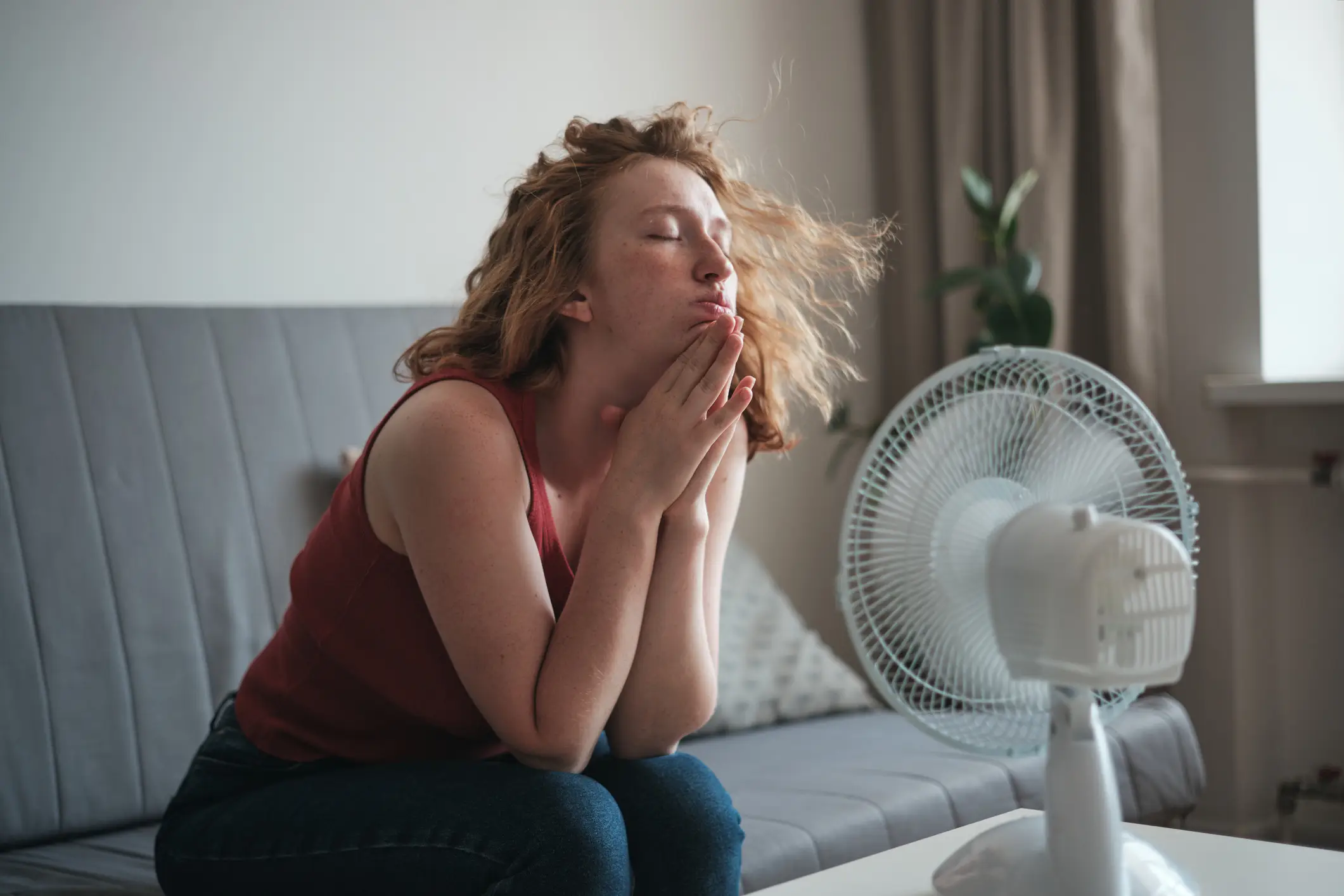 A doctor has issued a warning about the hidden health risks of sleeping with a fan on all night. (MementoJpeg/Getty)