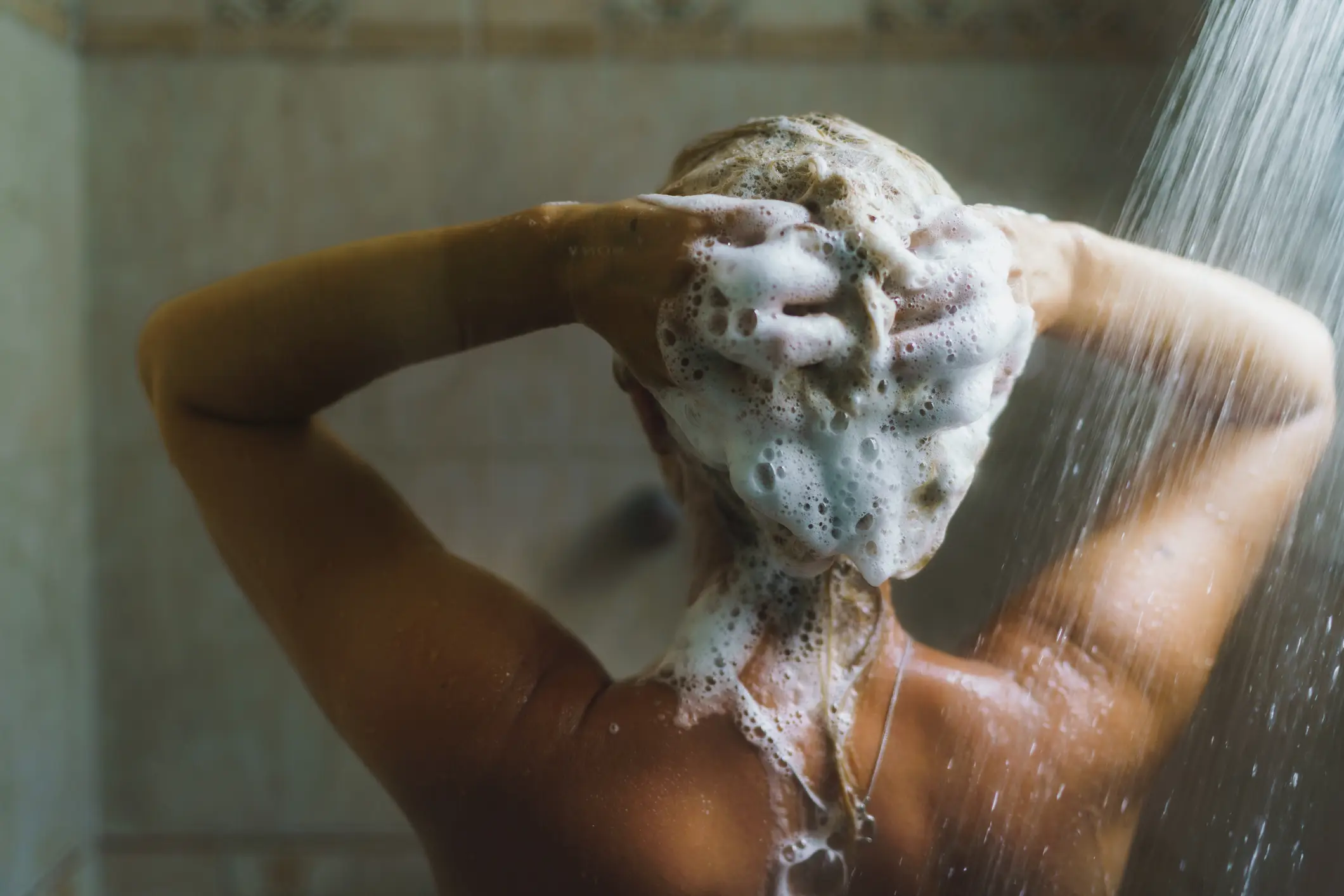 It's a common belief that washing too frequently strips the hair of its natural oils (StockPlanets/Getty