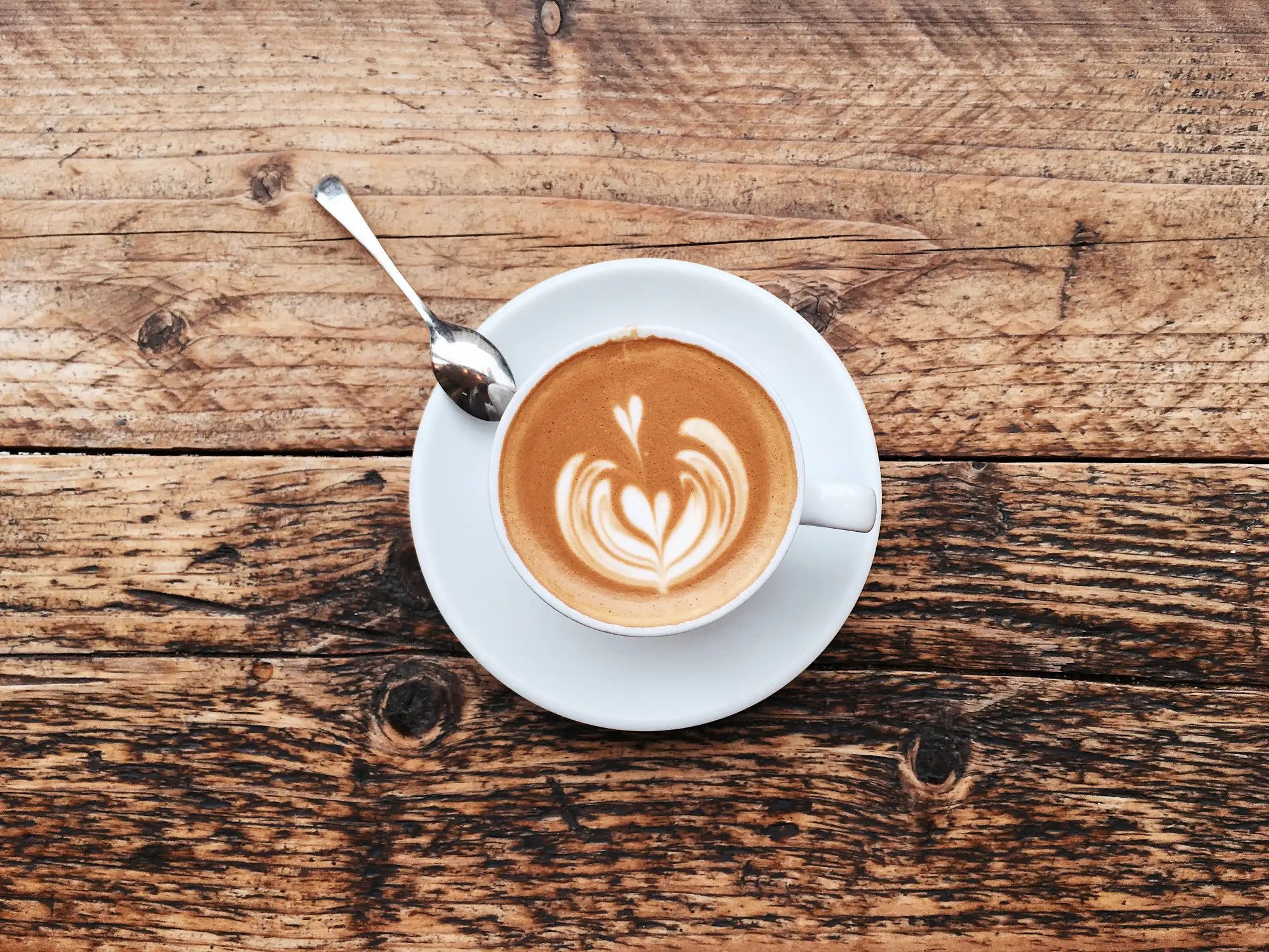 The billionaire is even coming for our coffee trips. (Getty stock images)