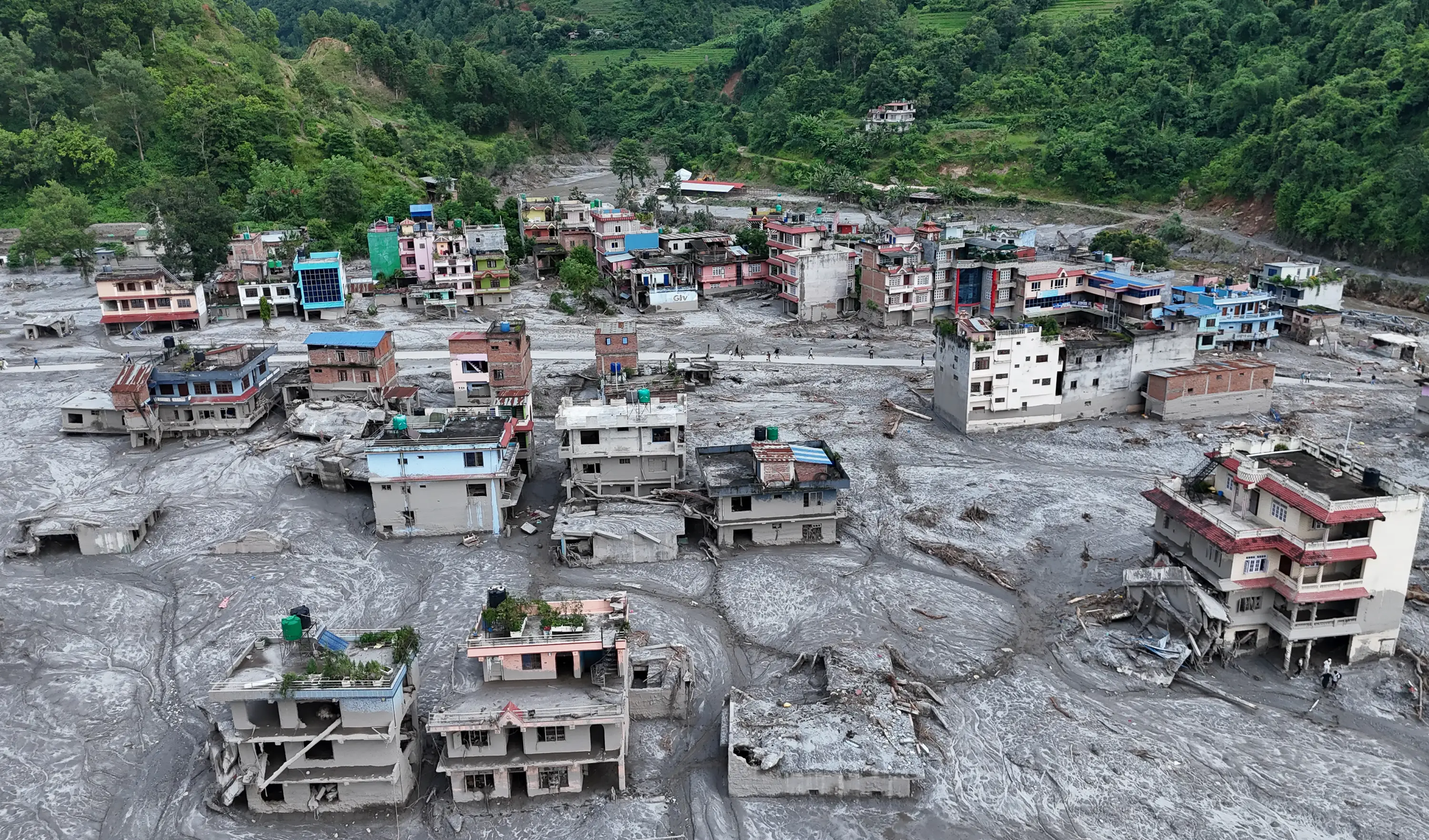 Experts say we're already seeing disruption and devastation from droughts and floods (Ritesh Shukla/Getty Images)