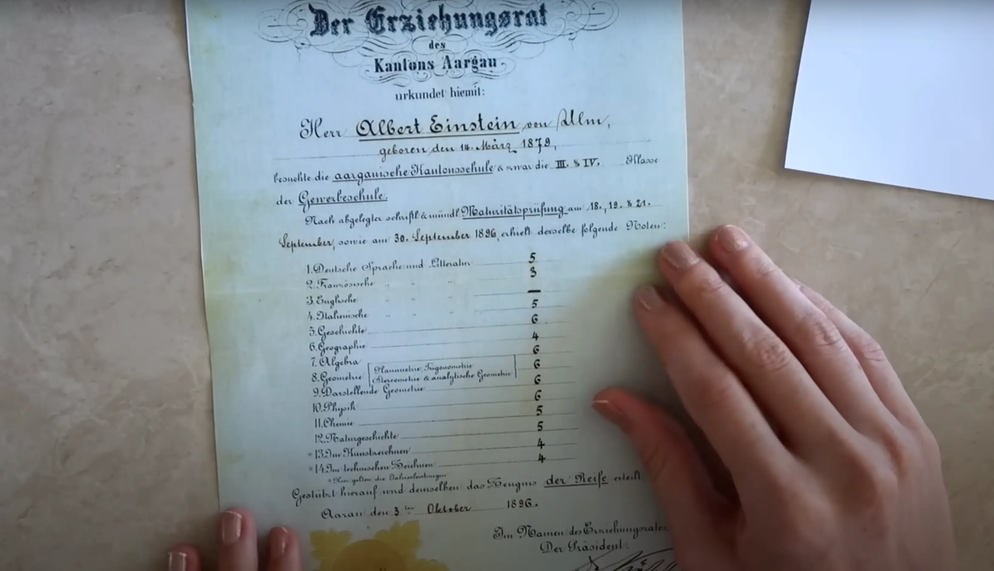 The YouTuber revealed Albert Einstein's report card (YouTube/@tibees)