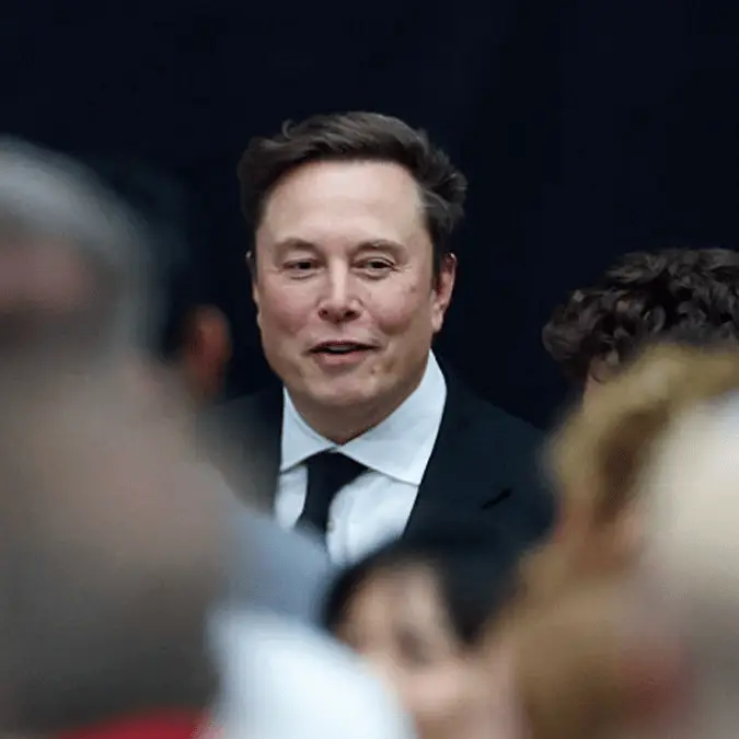 Lip reader 'decodes' Elon Musk's discussion as he's seen talking at Charlie Kirk's memorial