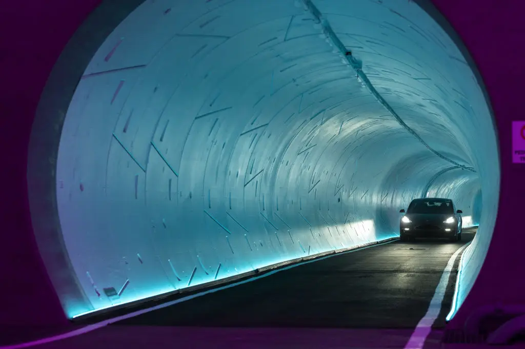 A Tesla EV passes through an underground tunnel (Las Vegas / Bloomberg / Contributor / Getty)