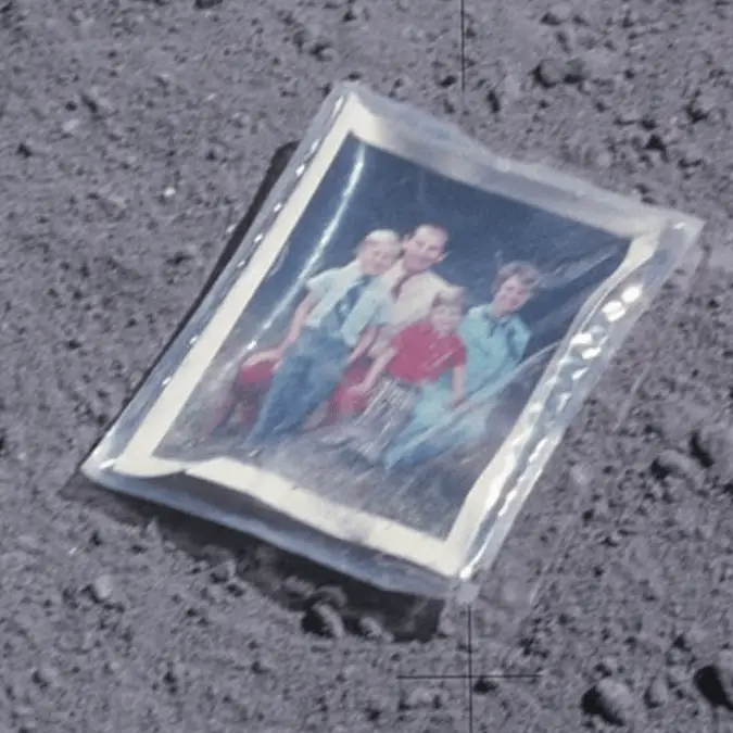 Apollo 16 astronaut reveals hidden message behind the family portrait he left on the moon in 1972