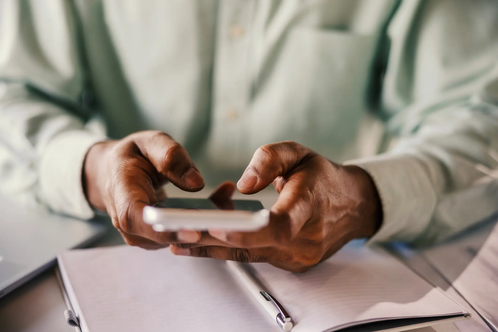One new study has revealed the benefits of physically taking notes compared to typing them on your smartphone (Getty Stock)
