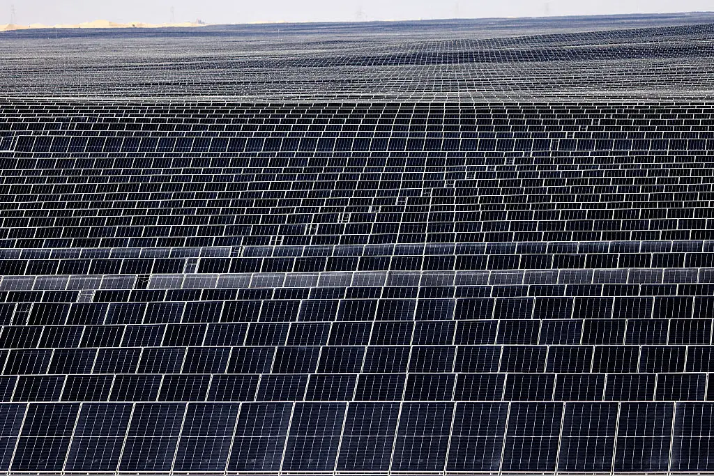 The panels create a temperature difference in contrast to the sand, driving updrafts which then lead to rain clouds (Karim Sahib/AFP via Getty Images)