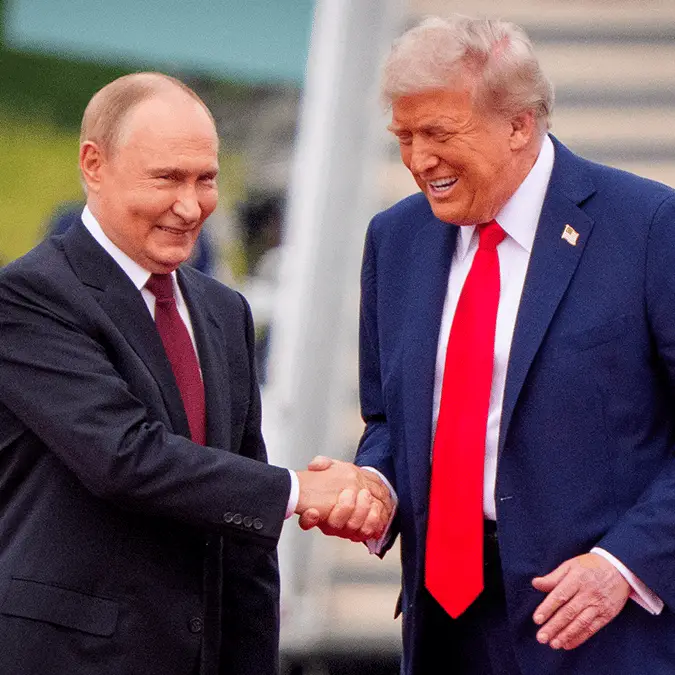 Trump pictured with Putin (Andrew Harnik / Staff via Getty)