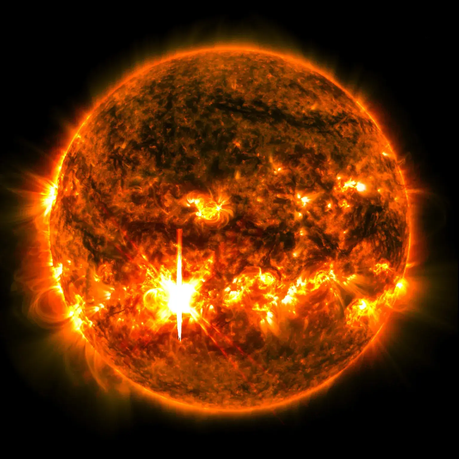The solar flare can be seen as a bright light (NASA/SDO)