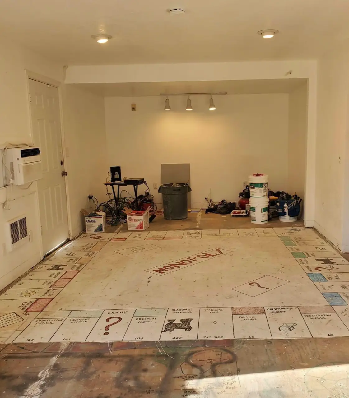 A couple were shocked to find a giant Monopoly board hidden beneath their carpet (Reddit)