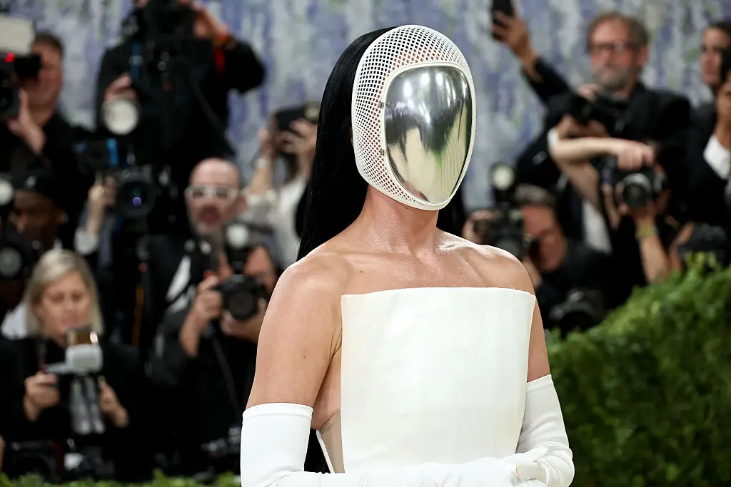 Katy Perry wore a silver helmet-like headpiece which covered her face (Jamie McCarthy/Getty Images)