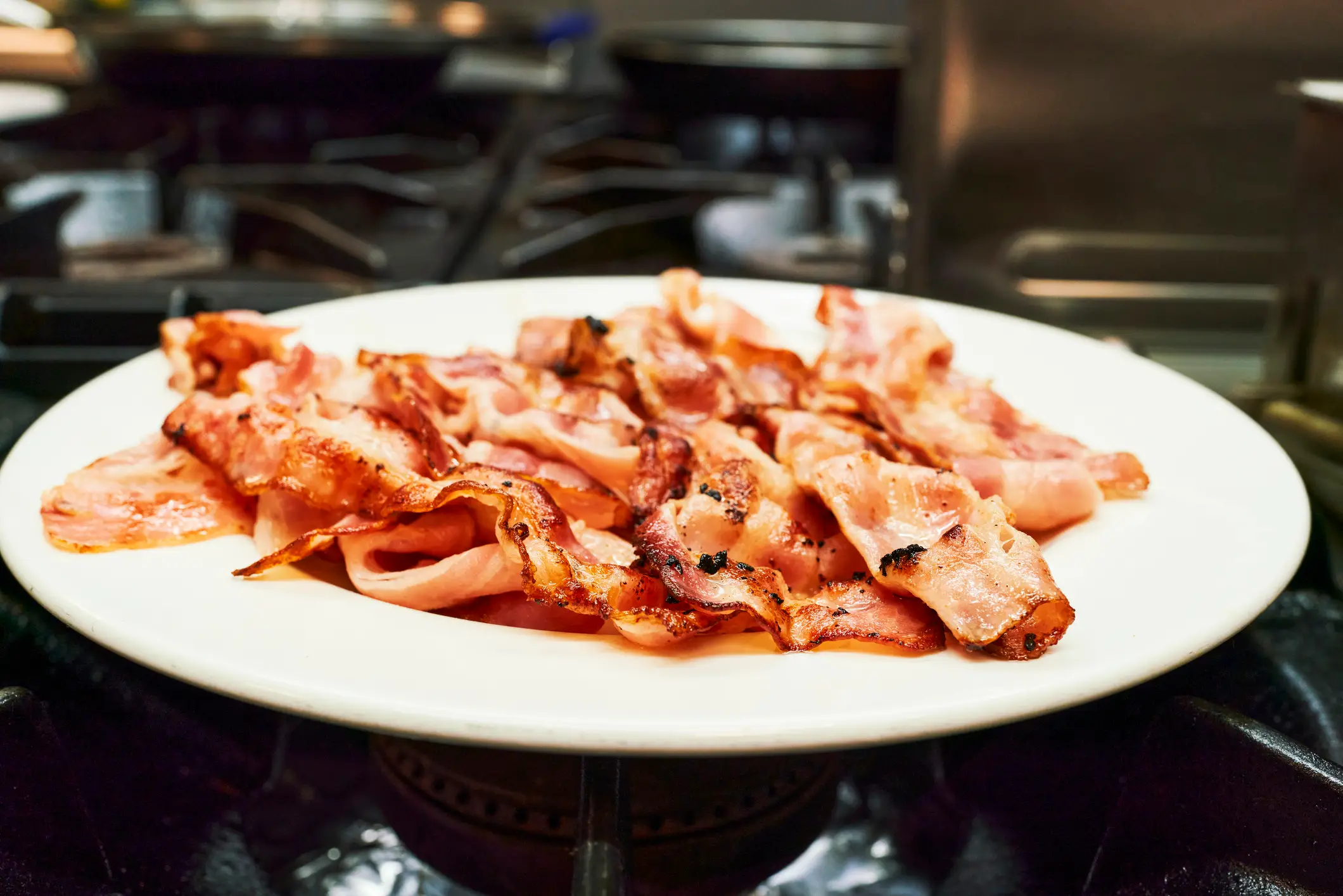 12,000 pounds of bacon have been recalled across three states (aire images / Getty)