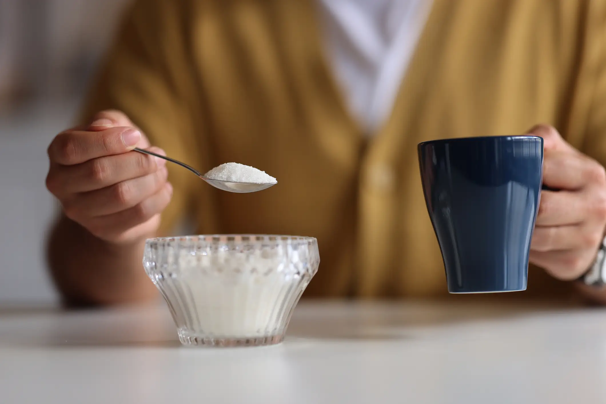 Sugar is reportedly not the number one cause of cavities (ridvan_celik / Getty)