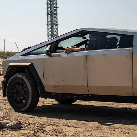 YouTube/Detroit Tesla / SERGIO FLORES/Contributor / Getty