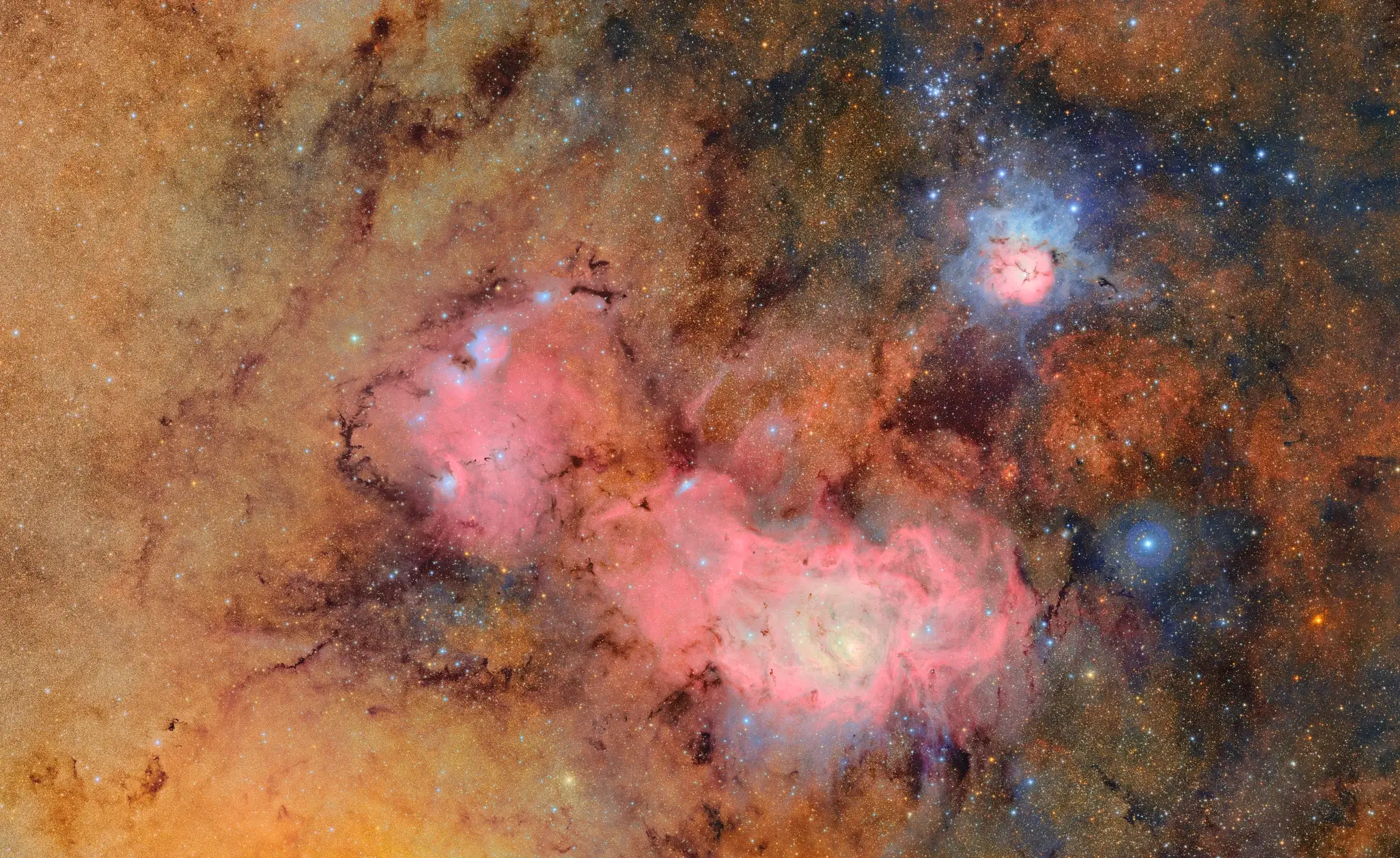 The Trifid nebula (top) and the Lagoon nebula, located several thousand light-years away from Earth.. (NSF–DOE Vera C. Rubin Observatory)
