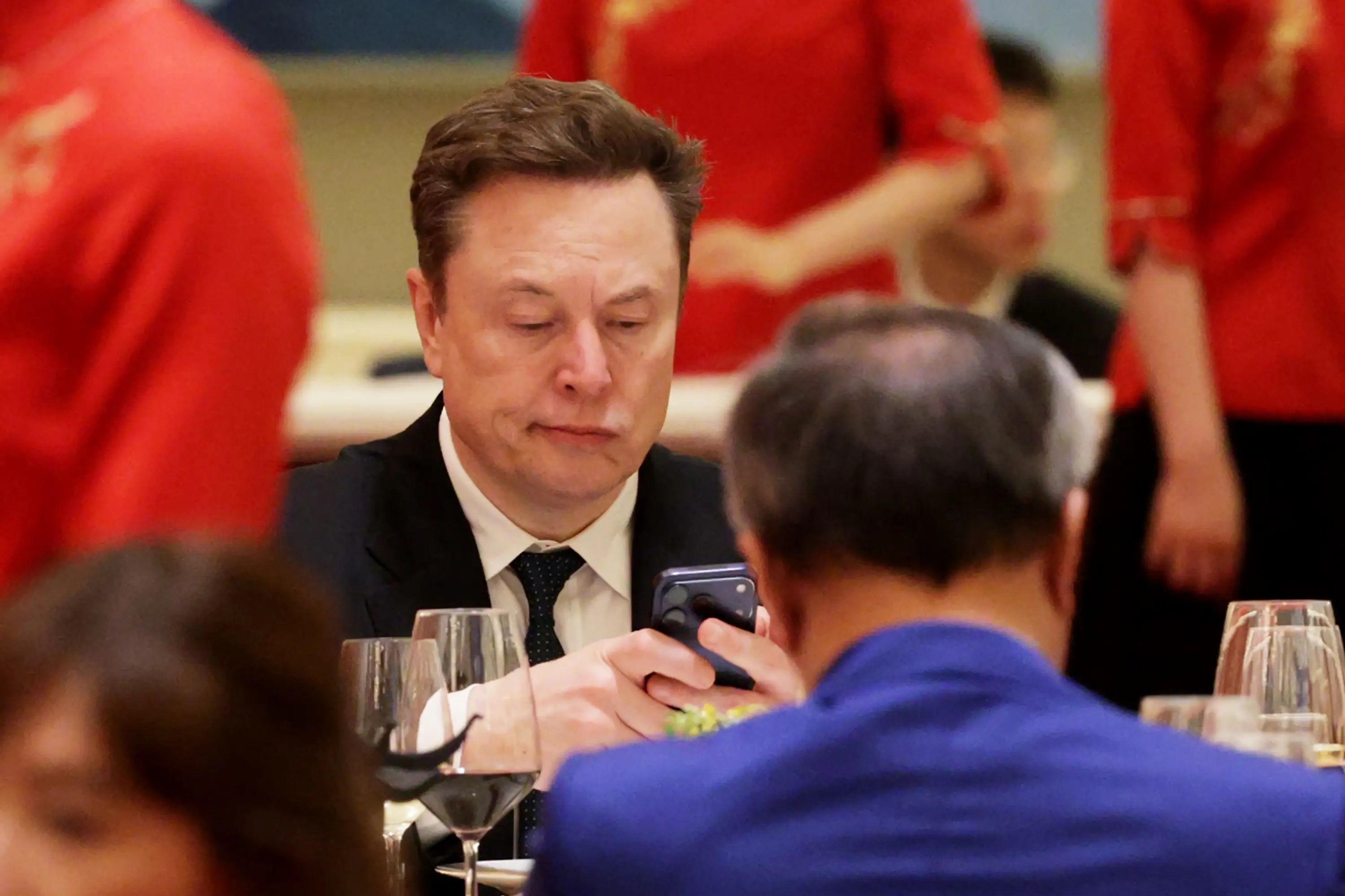 Elon Musk has argued that it 'doesn't make sense' for FSD to be at fault for the fatal crash (Kevin Dietsch/Getty Images)