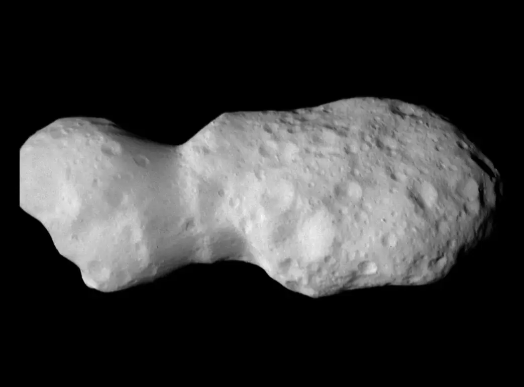 The Donaldjohanson asteroid has an unusually peanut-like shape, and it is estimated to have originated from a much larger body (NASA/Goddard/SwRI/Johns Hopkins APL/Brian May/Claudia Manzoni)