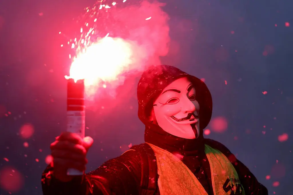 Anonymous have repeatedly spoken out and targeted right wing governments like Trump's presidency and Putin's Russia (Gregoire Campione/AFP via Getty Images)