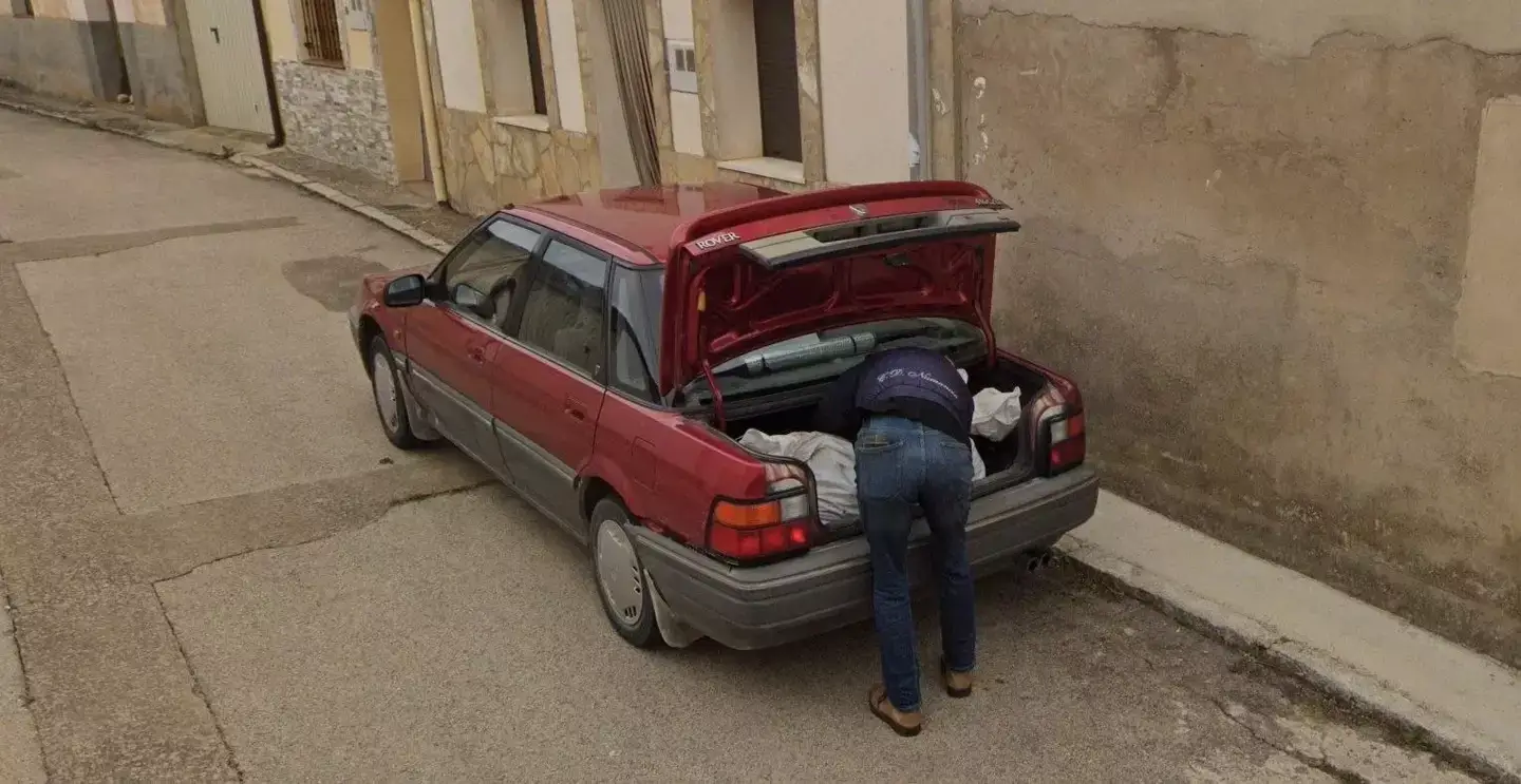 The man was caught loading a body into a car (Google Maps)