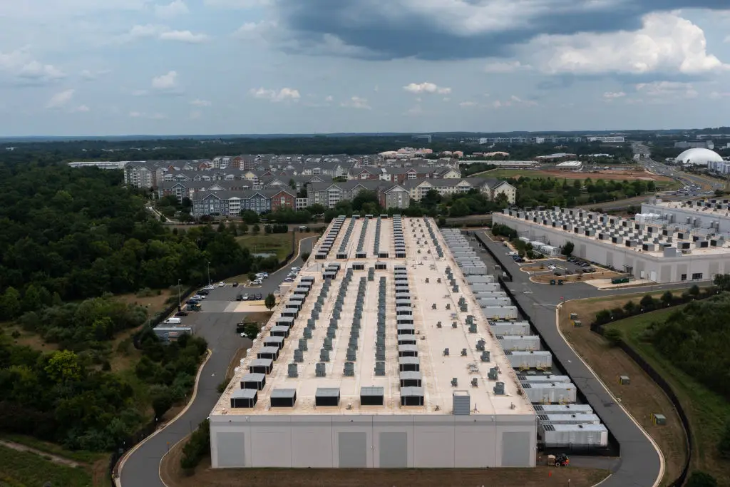 Many are opposed to data centers being built in their local area, as the immediate and worldwide cost is immense (Nathan Howard/Getty Images)