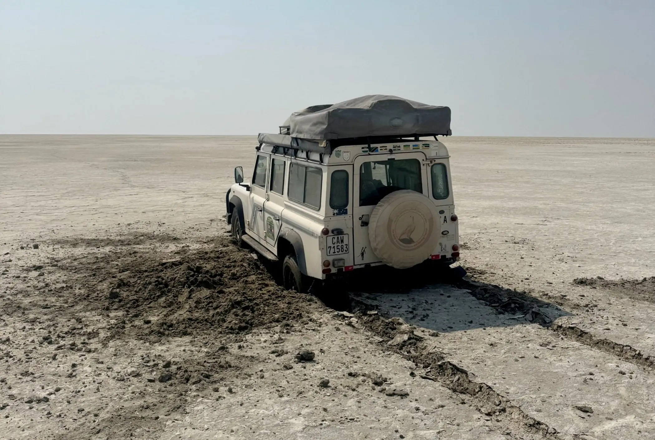 The friends were stuck when their Land Rover sank in the desert (Henry Harrison/Todd Benney/SWNS)