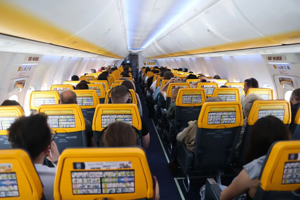 The airline requires parents to be seated with children, yet mandates the purchase of a 'family seat' in order to do this (Jakub Porzycki/NurPhoto via Getty Images)