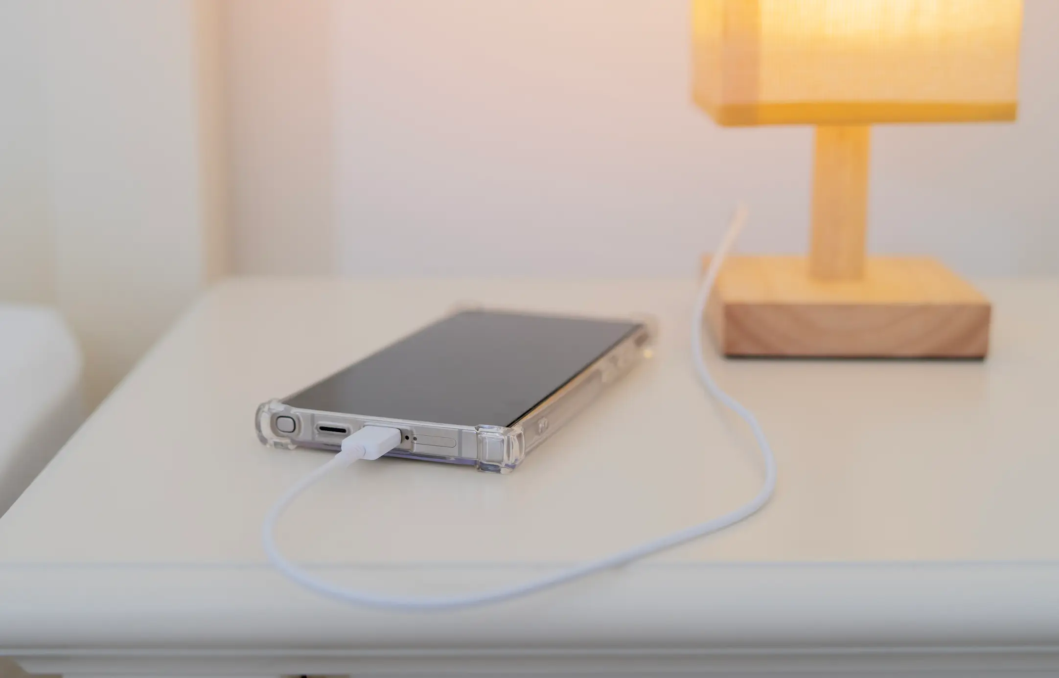 Charging your phone during the night has an unexpected risk (Getty Stock)