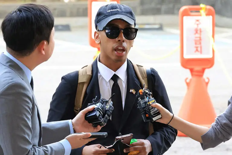 Johnny Somali was arrested and charged with eight criminal offenses in South Korea (YONHAP/AFP via Getty Images)