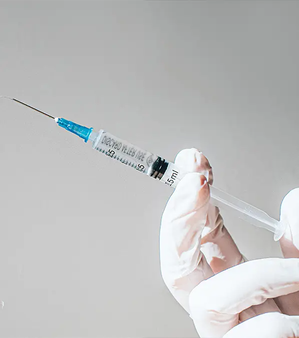 A vaccine injection (Catherine Falls Commercial/Getty Images)