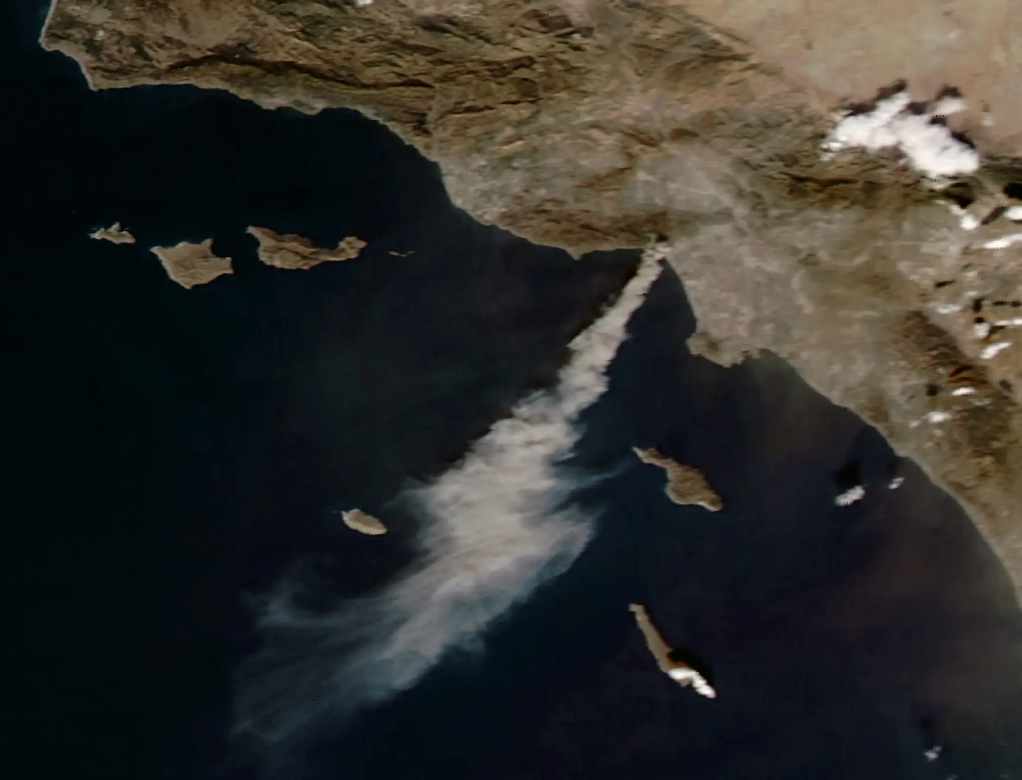 The images were captured by a NASA satellite (NASA Earth Observatory/Wanmei Liang)