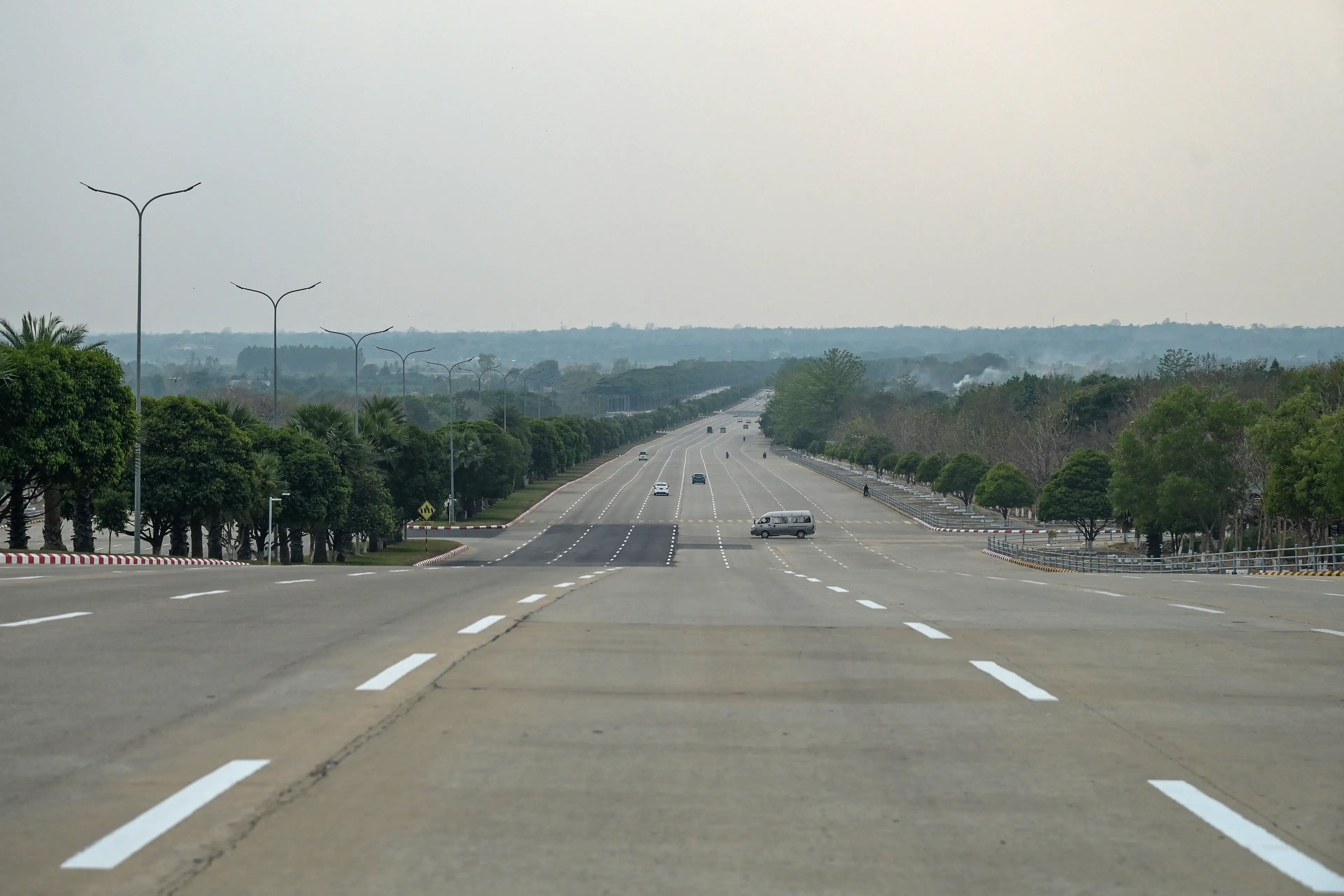 The huge 20-lane highways are empty (STR/AFP via Getty Images)